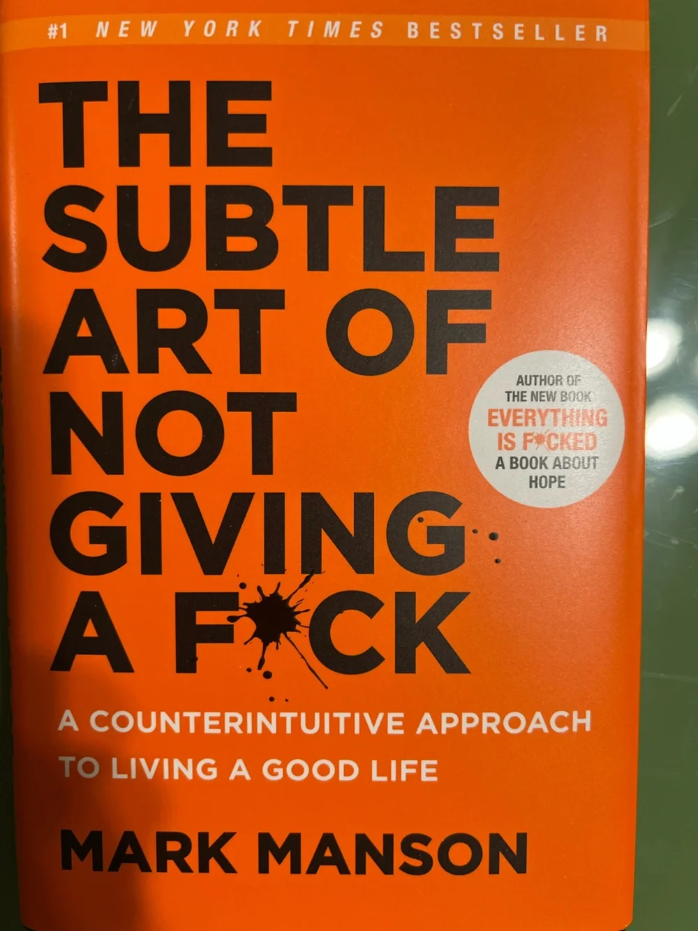 The Subtle Art of Not Giving a F*ck — Orange Hardcover Coffee Table Book